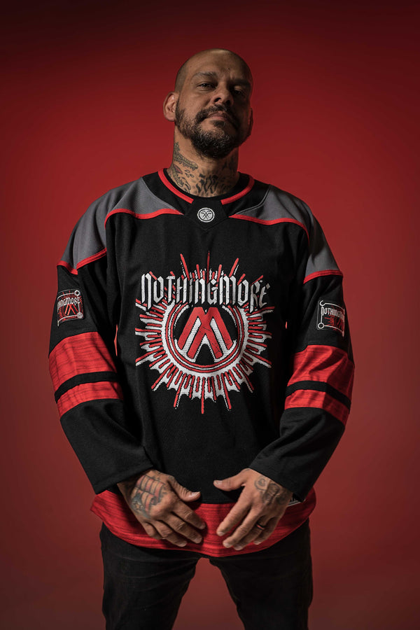 NOTHING MORE 'Deja Vu' hockey jersey in black, charcoal grey, and white front on male model