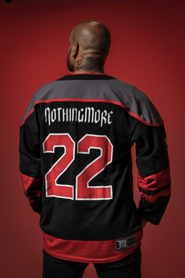 NOTHING MORE 'Deja Vu' hockey jersey in black, charcoal grey, and white back on male model