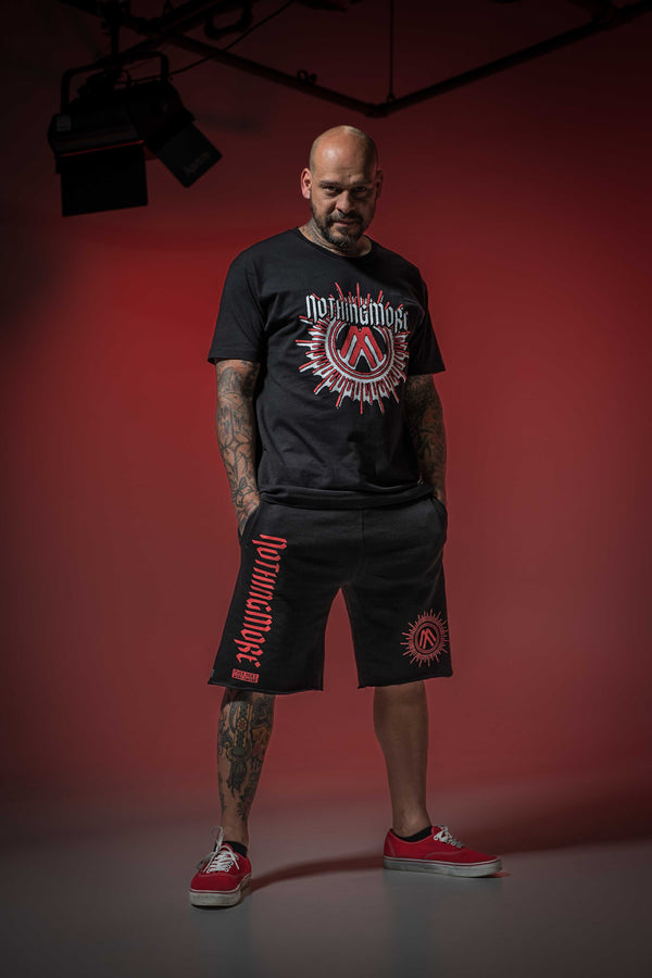 NOTHING MORE 'NEVERLAND' fleece hockey shorts in black on male model