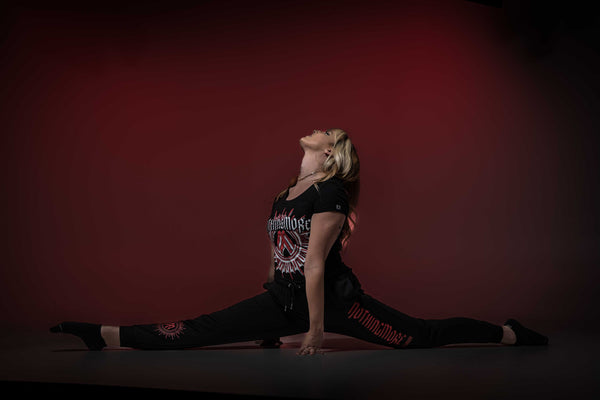 NOTHING MORE 'NEVERLAND' hockey jogging pants in black on female model