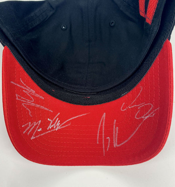 NOTHING MORE 'NEVERLAND' limited edition, autographed stretch fit hockey cap in black with red brim and red stripes close up