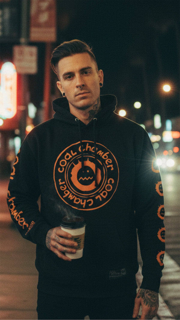 COAL CHAMBER 'LOCO' pullover hockey hoodie in black with orange print on model