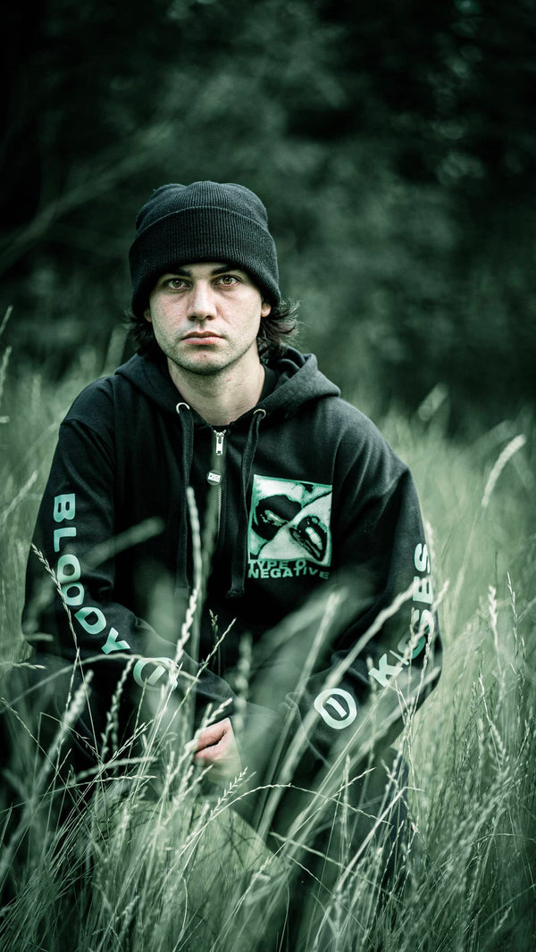 TYPE O NEGATIVE 'BLOODY KISSES' full zip hockey hoodie in black front view on male model