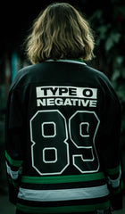 TYPE O NEGATIVE 'THORN' deluxe hockey jersey in black, kelly green, and white back view on model