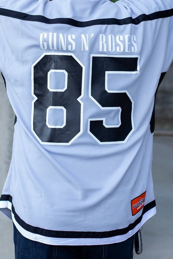 GUNS N' ROSES 'THE KINGS' deluxe hockey jersey in grey, black, and white back view on model