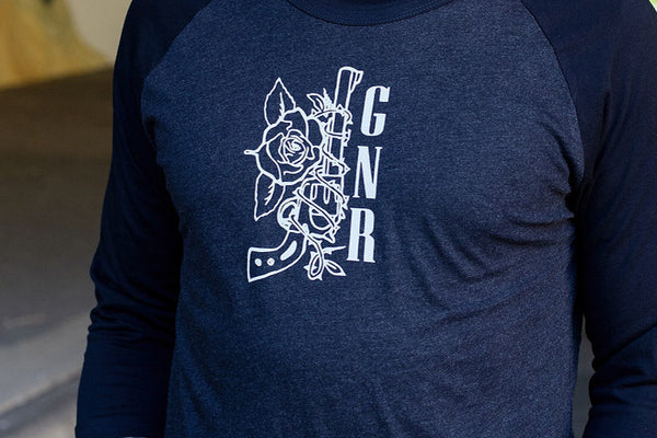 GUNS N' ROSES 'WORLDWIDE' hockey raglan t-shirt in graphite heather with black sleeves front view on model