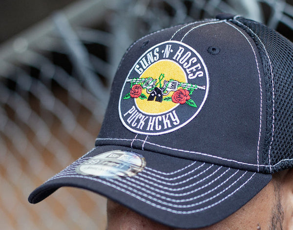 GUNS N' ROSES 'WORLDWIDE' stretch mesh contrast stitch hockey cap in black with white stitching front view on model
