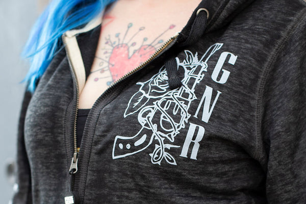 GUNS N' ROSES ‘WORLDWIDE’ women's full zip hockey hoodie in acid black front view on model