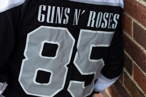 GUNS N' ROSES ‘WORLDWIDE’ hockey jersey in black, white, and grey back view on model