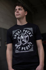 PUCK HCKY 'SHOOT PUCKS NOT PEOPLE - THE BIG SKATE' short sleeve hockey t-shirt in solid black on model front view