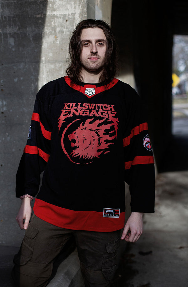 KILLSWITCH ENGAGE 'SKATE BY DESIGN' hockey jersey in black and red front view on model