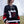 BLACK SABBATH ‘IRON MAN’ deluxe hockey jersey in black, white, and red front view on model