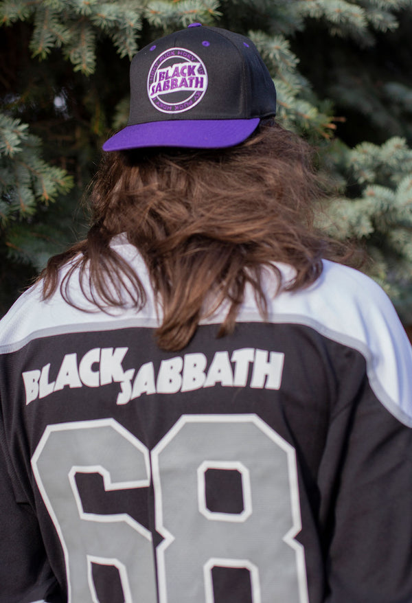 BLACK SABBATH ‘SCOREBLIND’ snapback hockey cap in black with purple brim on model