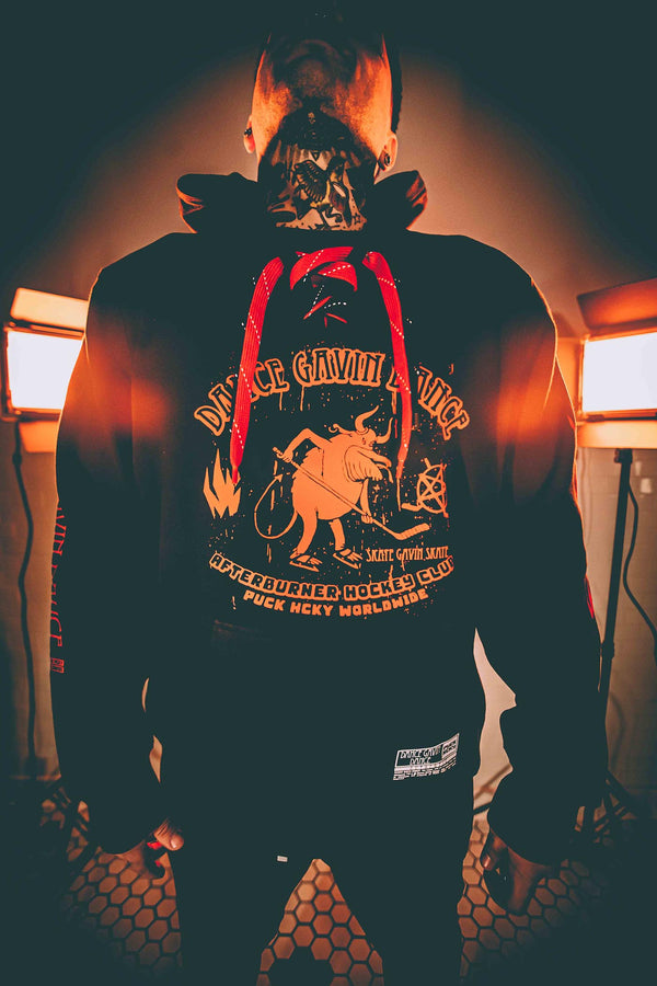 DANCE GAVIN DANCE ‘AFTERBURNER’ laced pullover hockey hoodie in black with red and black laces front view on model