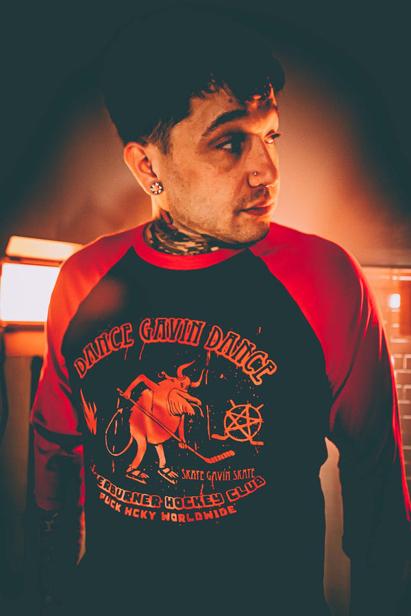 DANCE GAVIN DANCE ‘AFTERBURNER’ hockey raglan t-shirt in black with red sleeves front view on model