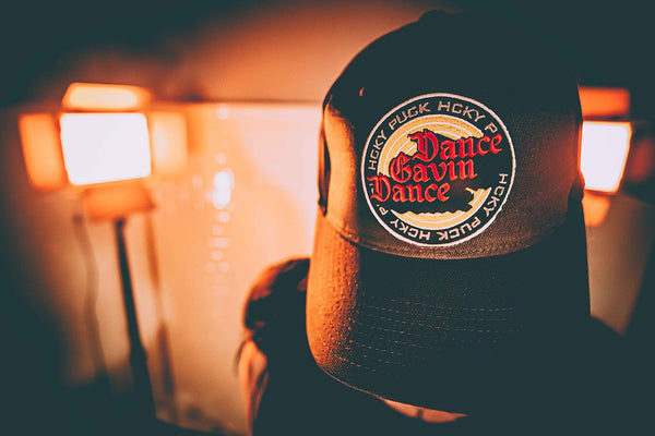 DANCE GAVIN DANCE 'EMBER' mesh back hockey cap in iron grey and black on model