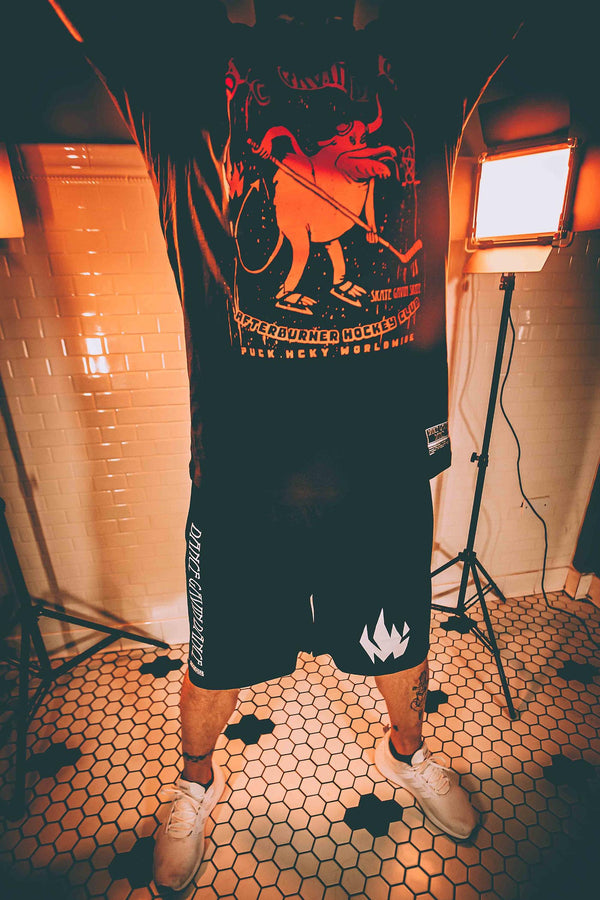 DANCE GAVIN DANCE 'MIDNIGHT CRUSADE' mesh hockey shorts in black on model
