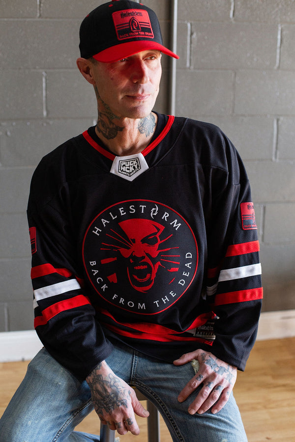HALESTORM 'BACK FROM THE DEAD' deluxe hockey jersey in black, red, and white front view on model