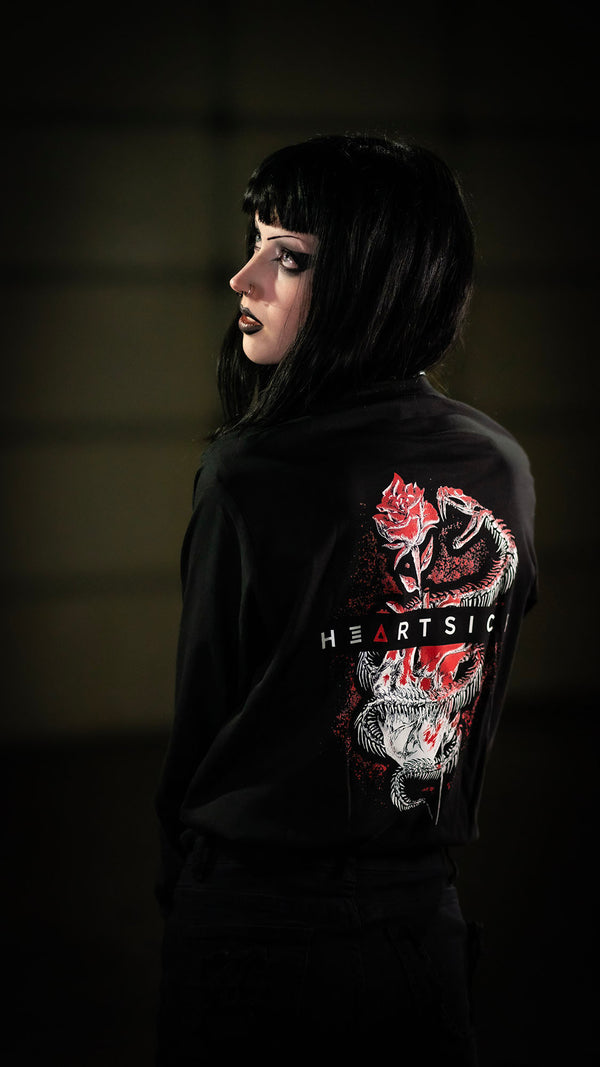 HEARTSICK ‘THE SNAKE AND THE ROSE’ long sleeve hockey t-shirt in black back view on model