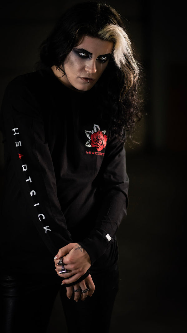 HEARTSICK ‘THE SNAKE AND THE ROSE’ long sleeve hockey t-shirt in black front view on model