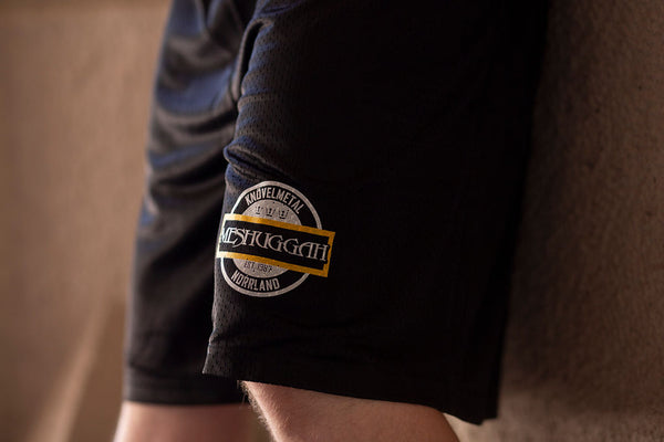 MESHUGGAH 'KNÖVELMETAL' mesh hockey shorts in black on model