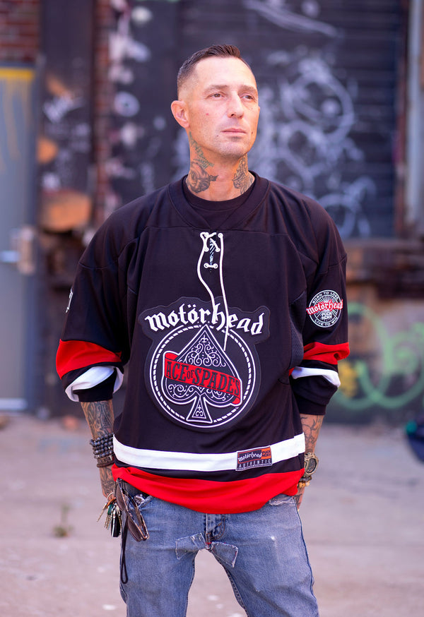 Motorhead 'Ace of Spades' deluxe hockey jersey in black, white, and red front view on model