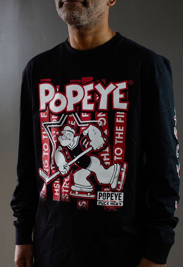 POPEYE 'STRONG TO THE FINISH' long sleeve hockey t-shirt in black front view on model