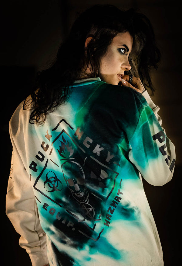 PUCK HCKY 'EQUIPMENT HAZMAT' crewneck hockey sweatshirt in bone with custom tie-dye back view on model