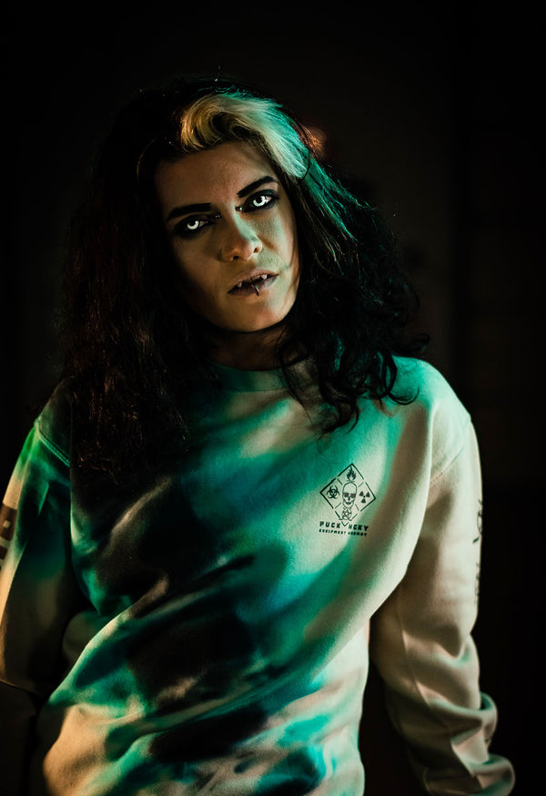 PUCK HCKY 'EQUIPMENT HAZMAT' crewneck hockey sweatshirt in bone with custom tie-dye front view on model