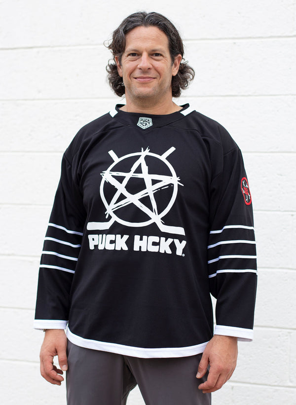 PUCK HCKY 'SKATE MARKS' hockey jersey in black and white on model