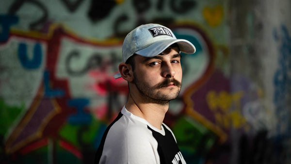 PUCK HCKY 'SLICED AND STACKED' tie-dyed hockey Dad hat on model