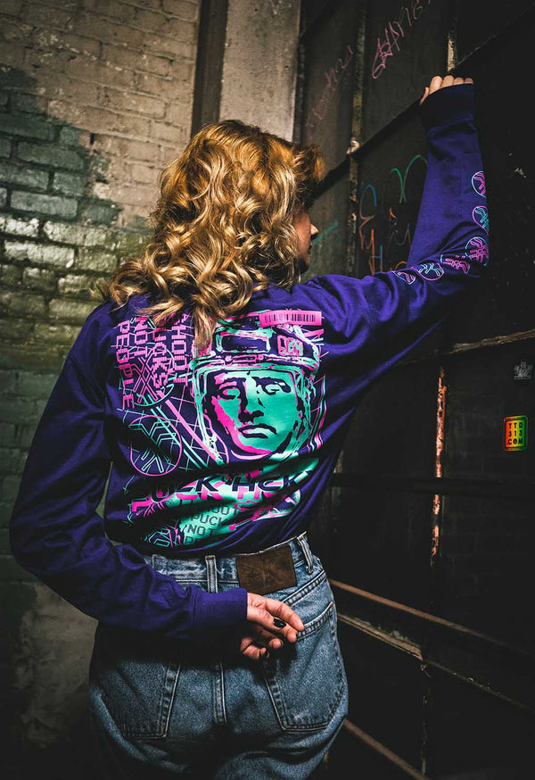 PUCK HCKY 'VAPORWAVE' long sleeve hockey t-shirt in purple back view on model