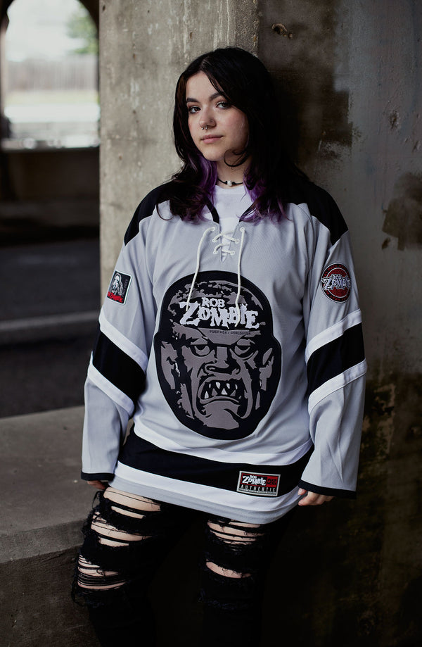 ROB ZOMBIE 'SKATERBEAST' deluxe hockey jersey in grey, black, and white front view on model