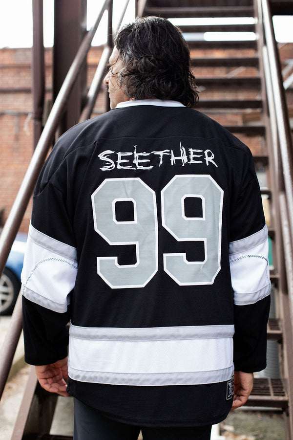 SEETHER 'THE S' hockey jersey in black, white, and grey back view on model