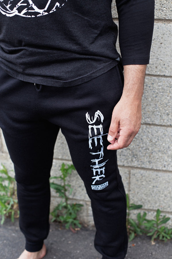 SEETHER 'THE S' hockey jogging pants in black front view on mode;