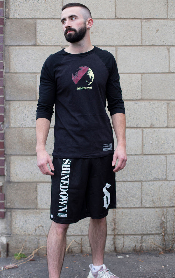 SHINEDOWN ‘ADRENALINE’ mesh hockey shorts in black front view on model