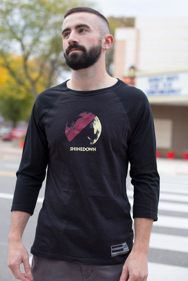 SHINEDOWN ‘PLANET ZERO’ hockey raglan t-shirt in graphite heather with black sleeves front view on model