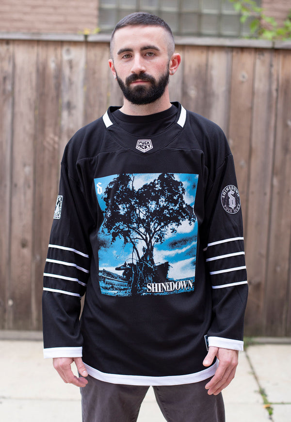 SHINEDOWN ‘WHISPER’ hockey jersey in black and white front view on model