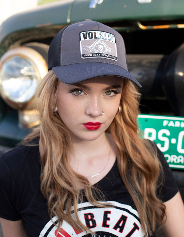 VOLBEAT ‘7 SHOTS’ mesh back hockey cap in iron grey and black front view on female model