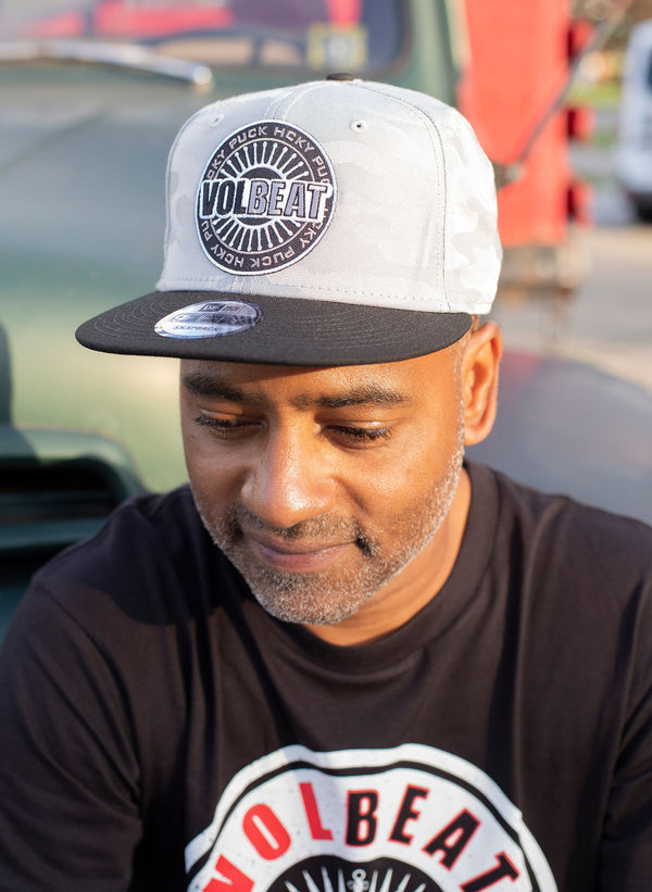 VOLBEAT ‘SEAL THE DEAL’ snapback hockey cap in grey camo with black brim front view on model
