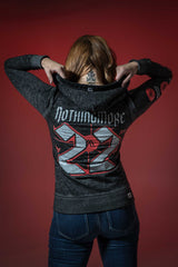 NOTHING MORE 'DÉJÀ VU' women's full zip hockey hoodie in acid black back view on model