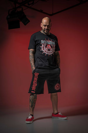 NOTHING MORE 'NEVERLAND' fleece hockey shorts in black on male model
