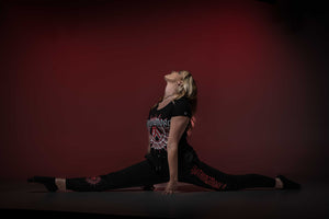 NOTHING MORE 'NEVERLAND' hockey jogging pants in black on female model