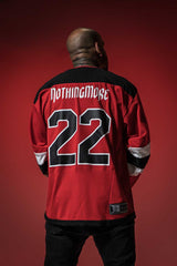 NOTHING MORE 'VALHALLA' deluxe hockey jersey in red, black, and white back view on male model