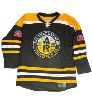 All That Remains 'Puckfire' hockey jersey in black, gold, and white AUTOGRAPHED front view