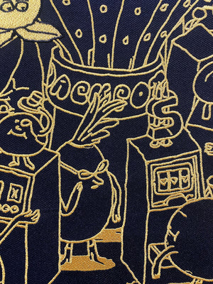 DANCE GAVIN DANCE 'JACKPOT JUICER' limited edition deluxe hockey jersey in charcoal grey, black, gold, and red crest close up