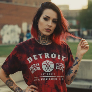 PUCK HCKY 'DETROIT CITY' short sleeve hockey t-shirt in red and black tie-dye on model