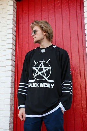 PUCK HCKY 'SKATE MARKS' hockey jersey in black and white on model