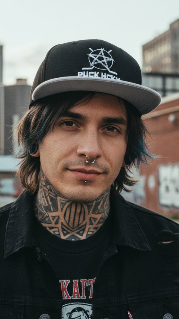 PUCK HCKY 'SKATE MARKS' flat bill snapback hockey cap in black white brim on model