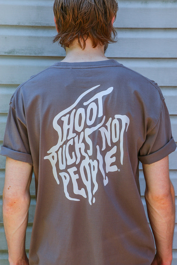 PUCK HCKY 'SHOOT PUCKS NOT PEOPLE - DRIPPY SCRIPT' short sleeve hockey pocket t-shirt in cinder back view on model